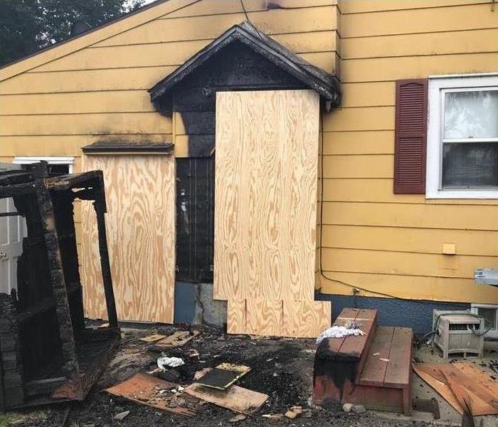 home with burned door 